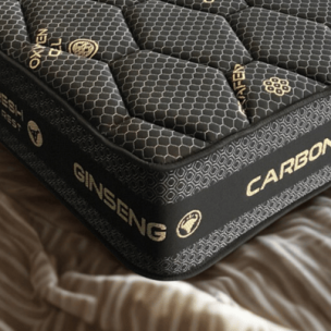 Detalle del Colchón Carbono & Ginseng negro con grafeno, acolchado de alta densidad y tejido transpirable premium. Un colchón de lujo que regula la temperatura, elimina la electricidad estática y ofrece un descanso revitalizante con máxima firmeza y confort. Precio especial